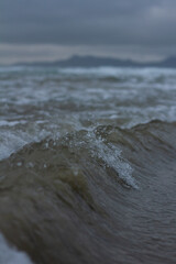 Small waves breaking off the coast of New Zealand. 