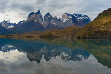 Cuernos del Paine reflecting in Lago Pehoe, Torres del Paine National Park, Chilean Patagonia, Chile