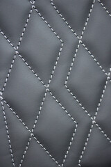 Black leather with diamond pattern stitching