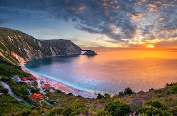 Beautiful sunset over mediterranean sea - Greece, Petani beach at Kefalonia island