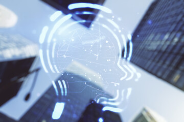 Abstract virtual artificial Intelligence interface with human head hologram on office buildings background. Multiexposure