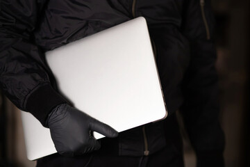 Thieves stole laptop computers at home.