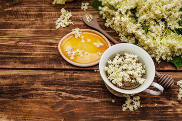 Tea from fresh elder flowers. Hot drink, honey, alternative medicine