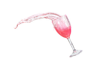 Pink splash water out of a glass on  white background.