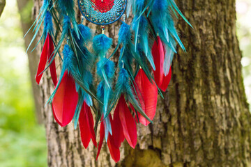 Handmade dream catcher with feathers threads and beads rope hanging