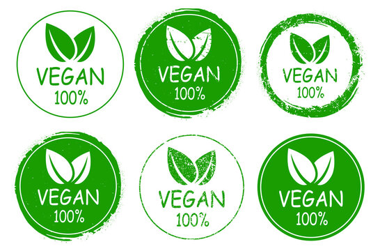 Organic 100% vegan design template raw healthy food logo symbol. Vector illustration icon sign. Isolated on white background. Rubber stamp style.
