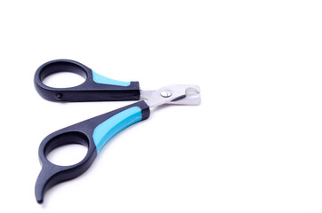 Cat claw scissors for cats with black and blue handle on a white background in macro