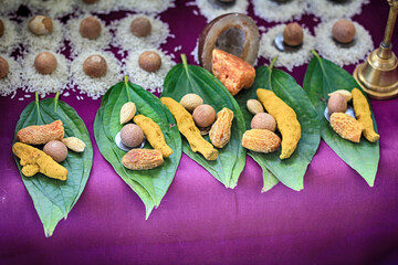 Traditional setting of metaphorical offerings to God during puja in an Indian home.