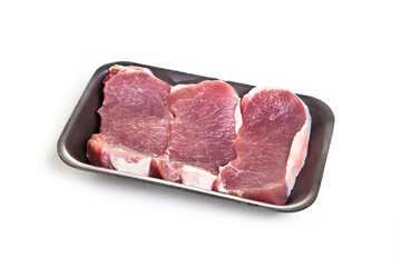raw beef steaks in the packageisolated on white background