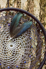 Handmade dream catcher with feathers threads and beads rope hanging