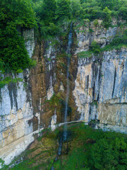 waterfall in the forest from drone, aerial view