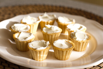 Tartlets with custard or cottage cheese.
