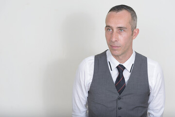 Portrait of mature handsome businessman with waistcoat