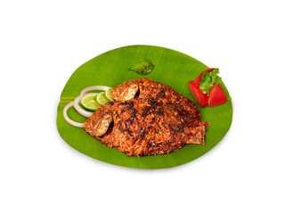 Delicious desi Indian fish fry served on a banana leaf, natural look how it is served in Indian local restaurants 