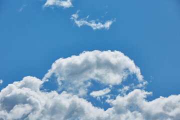 Naklejka na ściany i meble cumulus clouds on a summer day