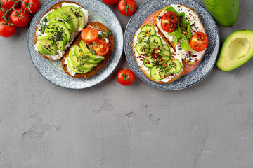 Assortment of vegan sandwiches with avocado and tomatoes