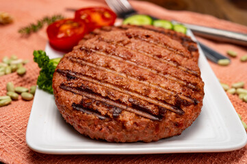 Source of fibre plant based vegan soya protein grilled burgers, meat free healthy food