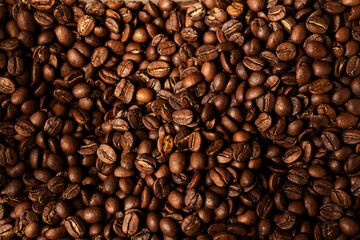 Background coffee beans. Pattern of brown roasted coffee bean beans