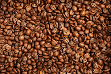 Background coffee beans. Pattern of brown roasted coffee bean beans