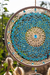 Handmade dream catcher with feathers threads and beads rope hanging