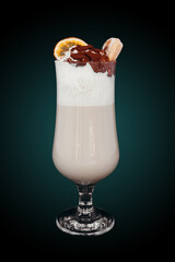Delicious Milkshake in glass cup isolated on blue gradient