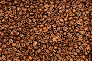 Background coffee beans. Pattern of brown roasted coffee bean beans