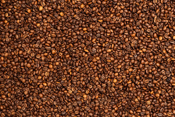 Background coffee beans. Pattern of brown roasted coffee bean beans
