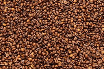 Background coffee beans. Pattern of brown roasted coffee bean beans