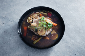 plant-based food, vegan noodles soup with mixed stir fry vegetables