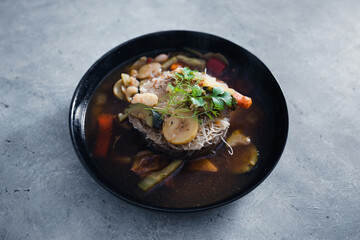 plant-based food, vegan noodles soup with mixed stir fry vegetables