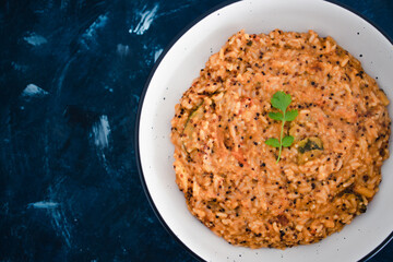 plant-based food, vegan quinoa and rice with mediterranean vegetables and red pesto