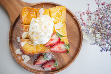  Honey toast with strawberry wooden plate