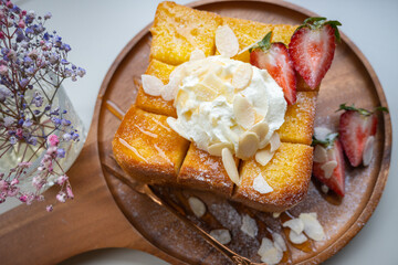  Honey toast with strawberry wooden plate