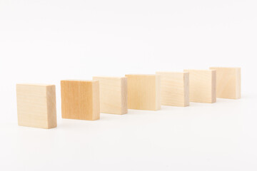 Obraz premium Wooden block toy isolated over white background. space for text