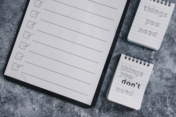 minimalism or introspection concept, notepads with texts Things you need and Things you dont need...