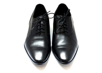 A pair of leather elegant shoes on a white background