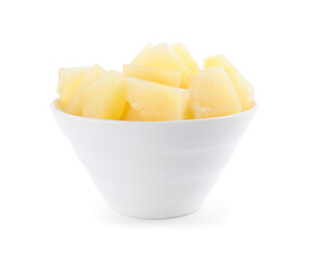 Pieces of delicious canned pineapple in bowl on white background