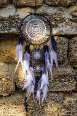 Handmade dream catcher with feathers threads and beads rope hanging