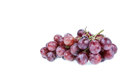 red grapes over white background