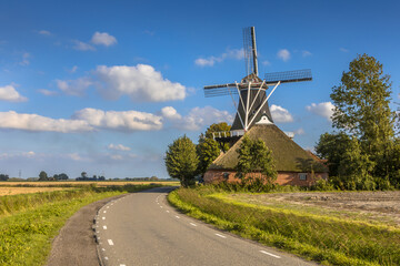 Typical dutch landscape windmill