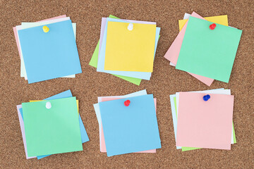 collection of colorful variety post. paper note pad reminder sticky notes pin paper on cork...