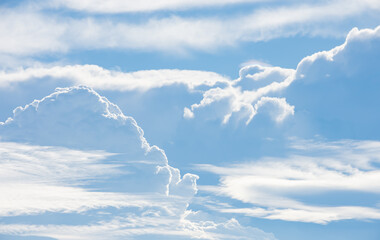 The beauty of the sky with clouds and the sun.