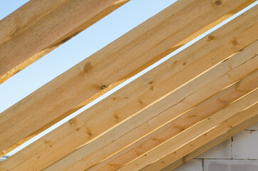 wooden bars against the sky. roof construction