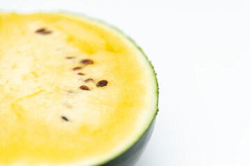 Ripe yellow watermelon at white background