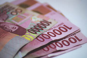 Banknotes worth 100,000 rupiah as official payment instruments in Indonesia