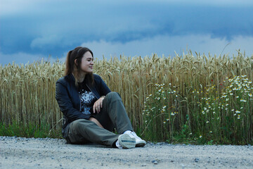 Alternative lifestyle of a woman on the meadow.