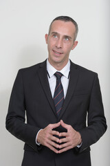 Portrait of mature handsome businessman in suit