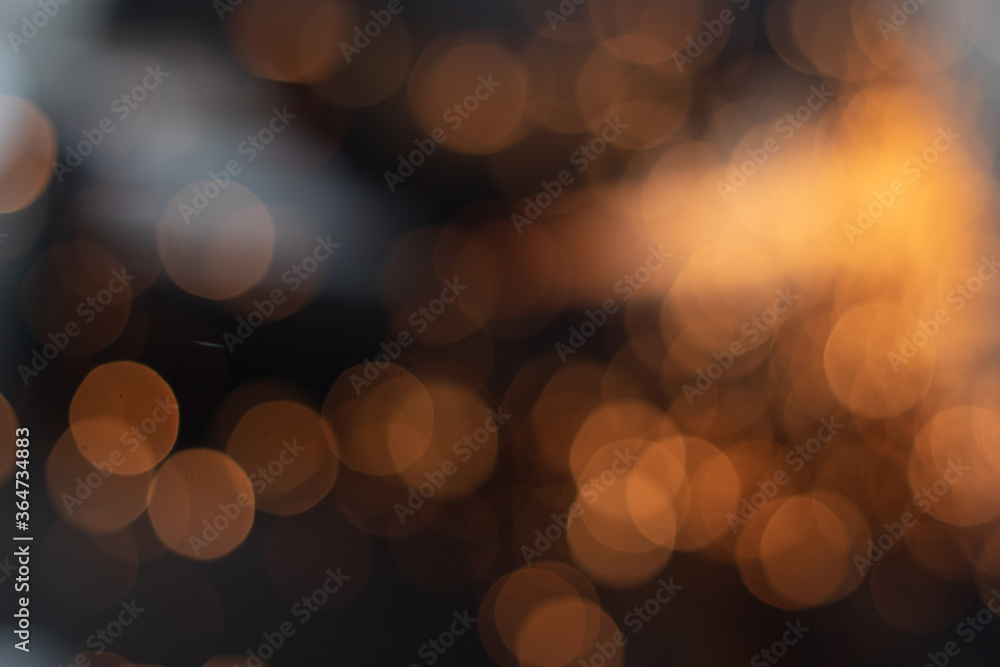 Wall mural gold abstract bokeh background, festive xmas abstract background with bokeh defocused lights and sta