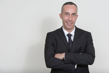 Portrait of mature handsome businessman in suit