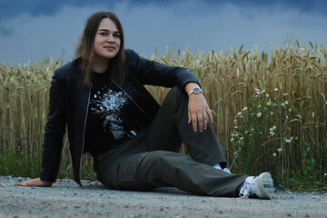 Alternative lifestyle of a woman on the meadow.